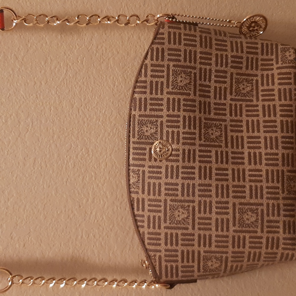 Anne Klein crossbody bag with gold and orange embellishment
